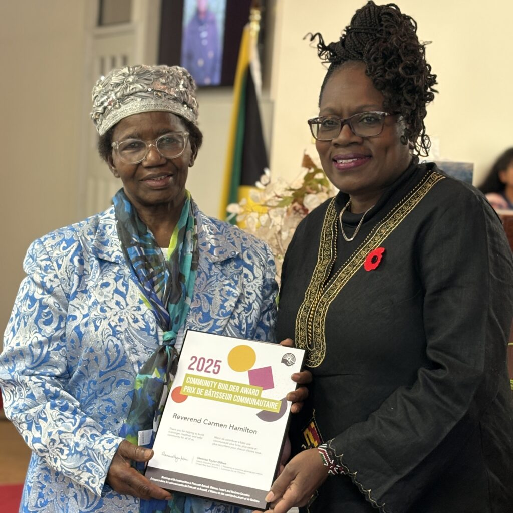 Sarah Onyango and Pastor Carmen Hamilton during a United Way East Ontario Community Builder Award.